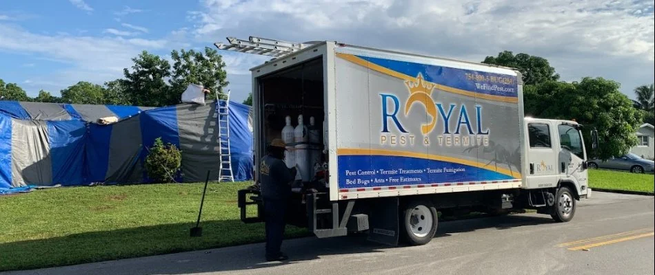 Work truck parked in front of a house being tented in Coral Gables, FL.