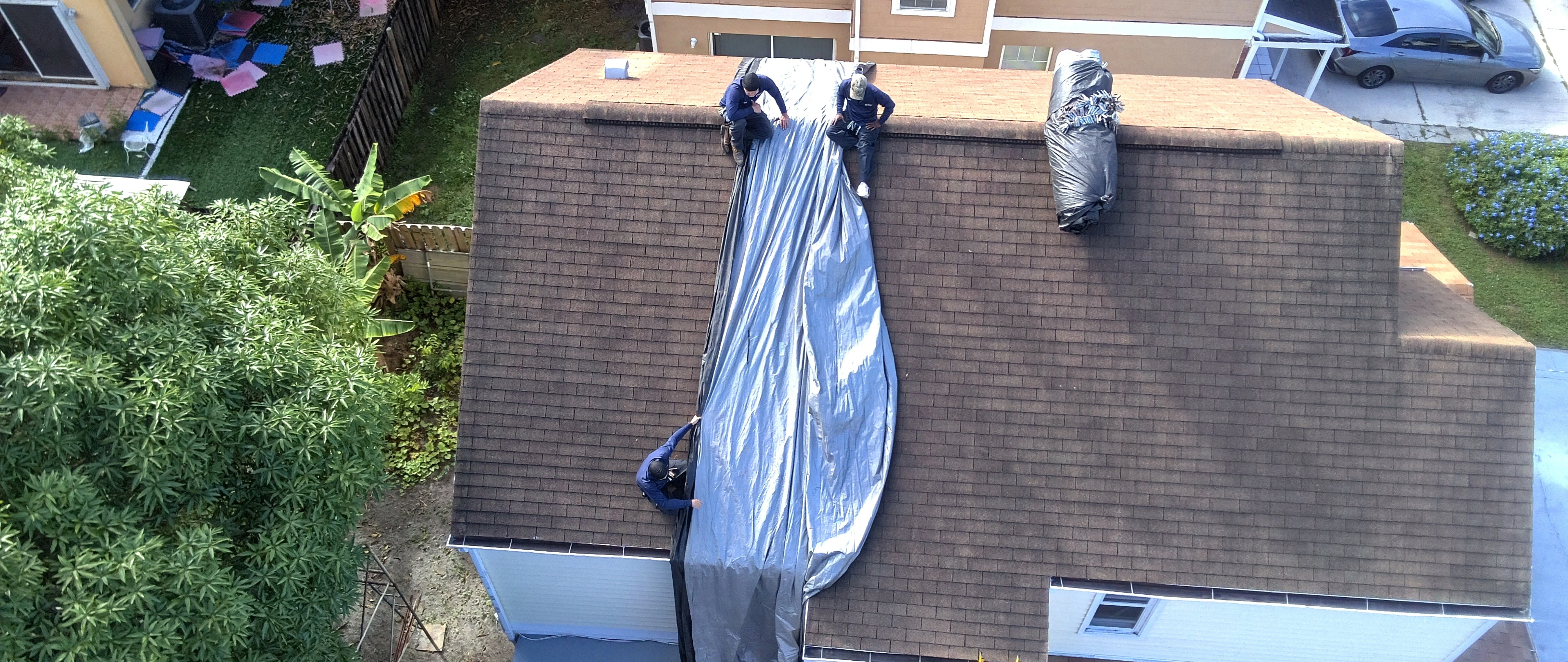 Truck in Miramar, FL, in front of a termite fumigation tent.