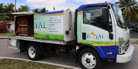 Royal Pest & Termite truck parked on street in Miramar, FL.